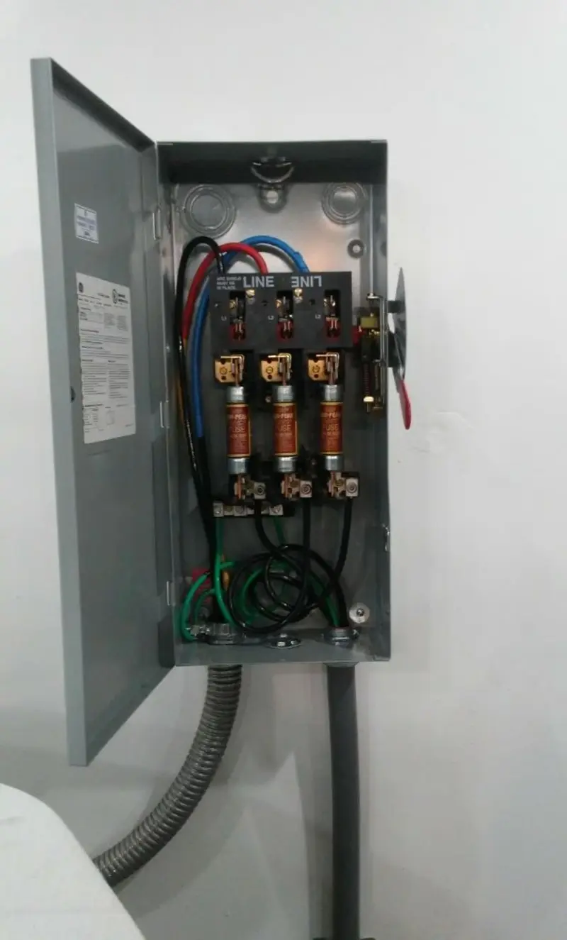 Three-phase disconnect switch installed for Smoke Detector Installation in Midway North